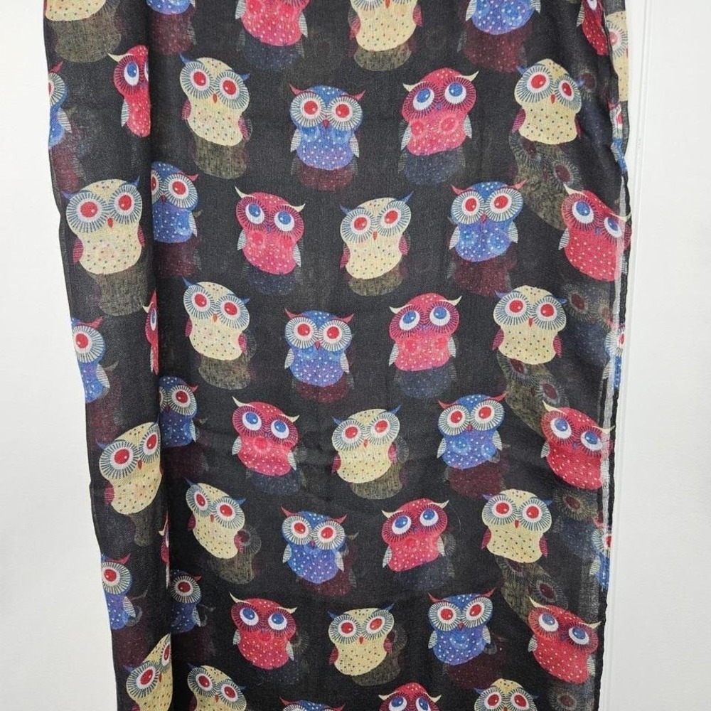 The Owls Scarf is a stylish and cozy accessory for women